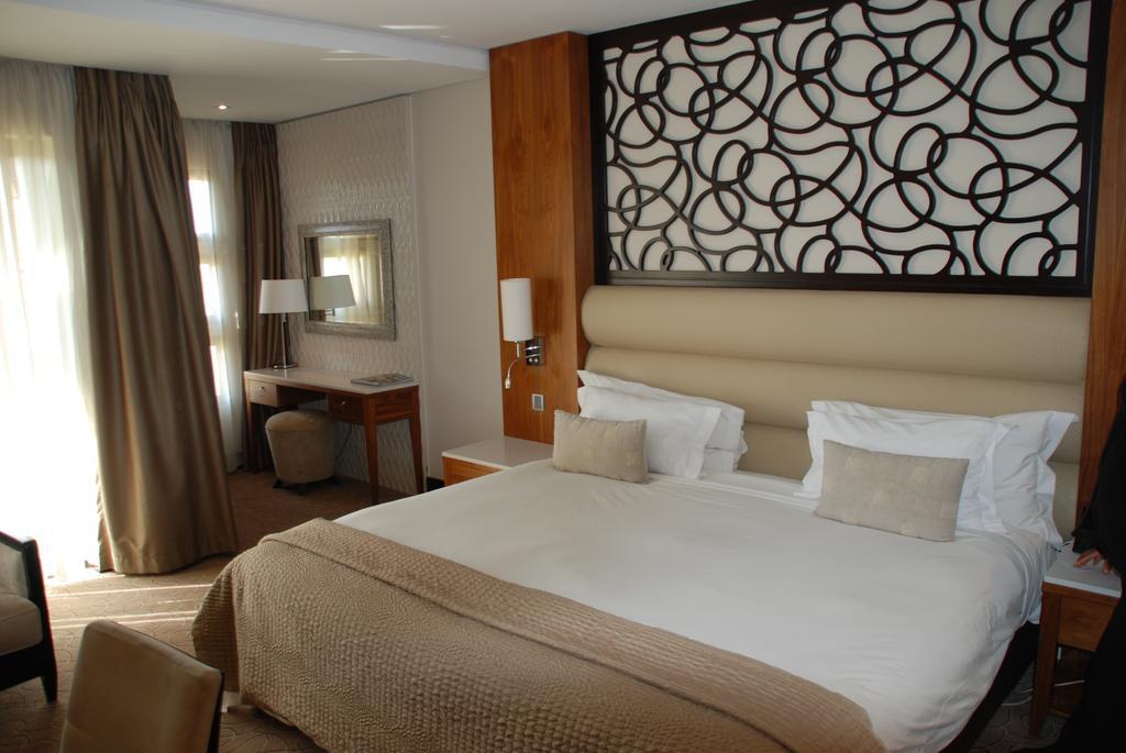 Royal Marang Hotel Phokeng Номер фото A bedroom in the hotel